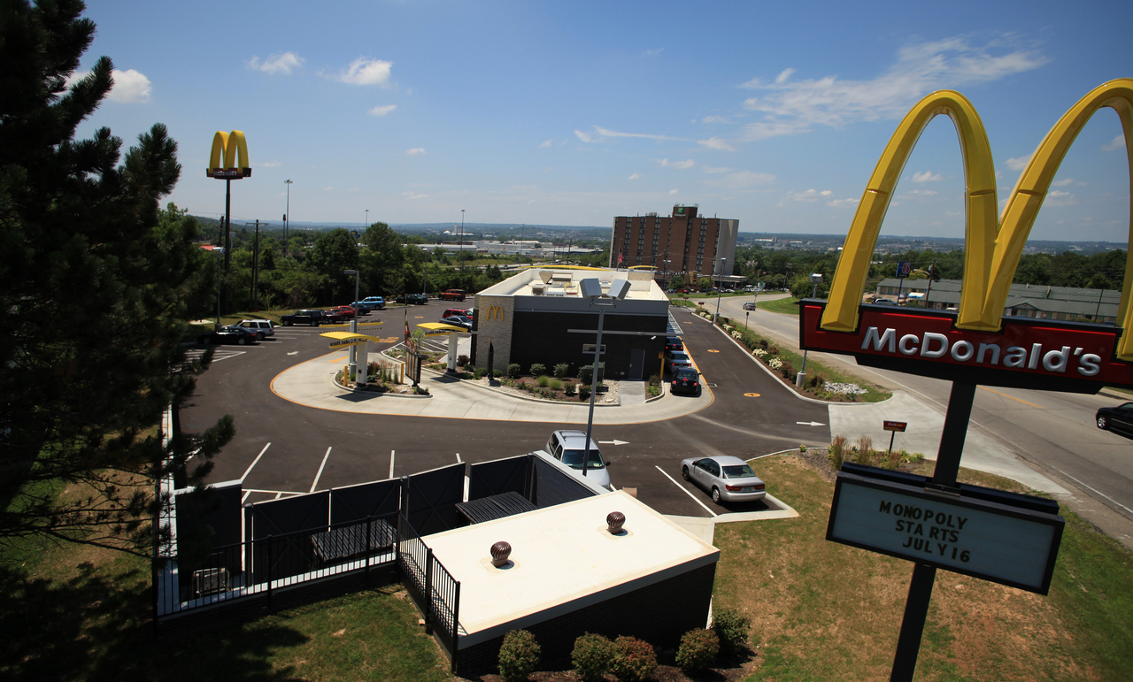 McDonald's restaurant with drive-thru on a sunny day.