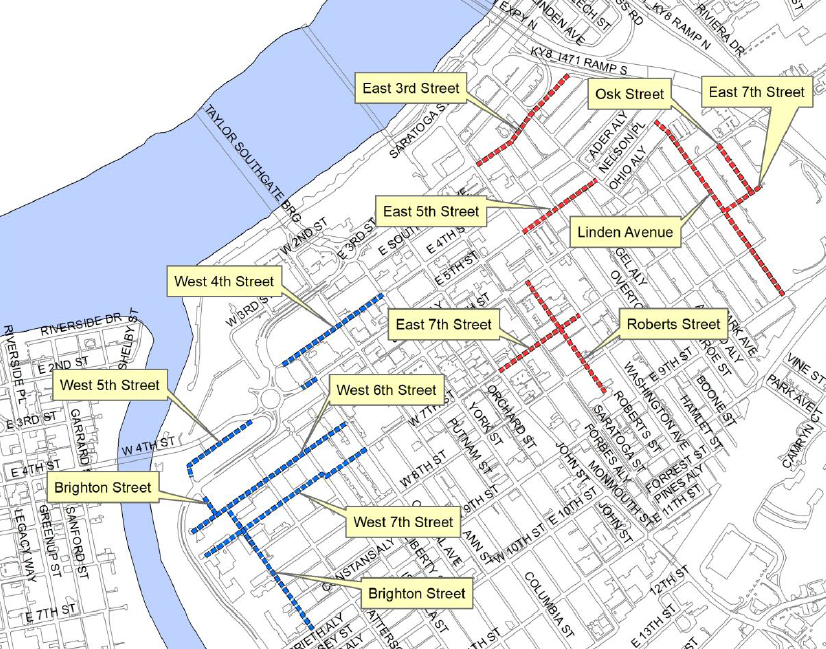 Map highlighting streets with colored lines and labels near a river.