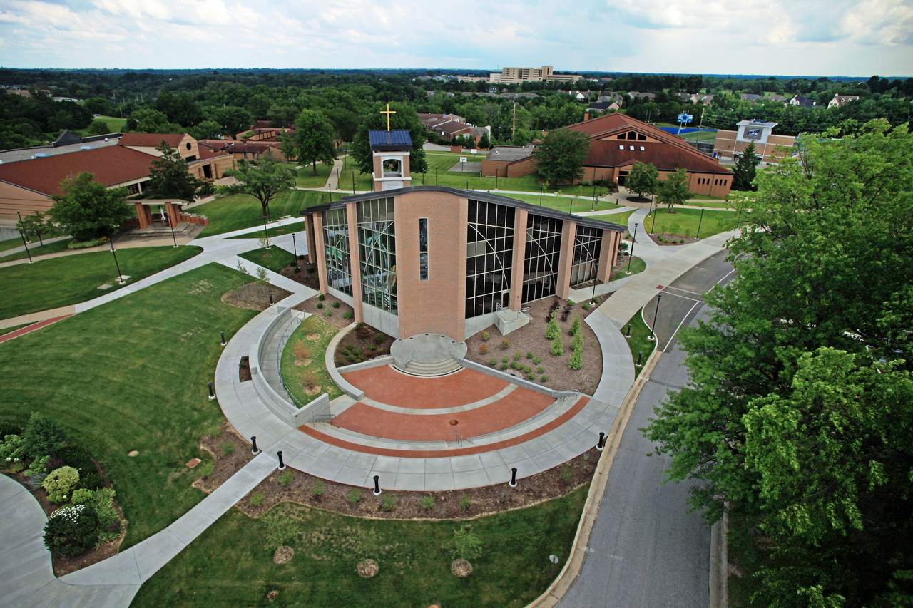 Aerial view of a campus with modern buildings and pathways.