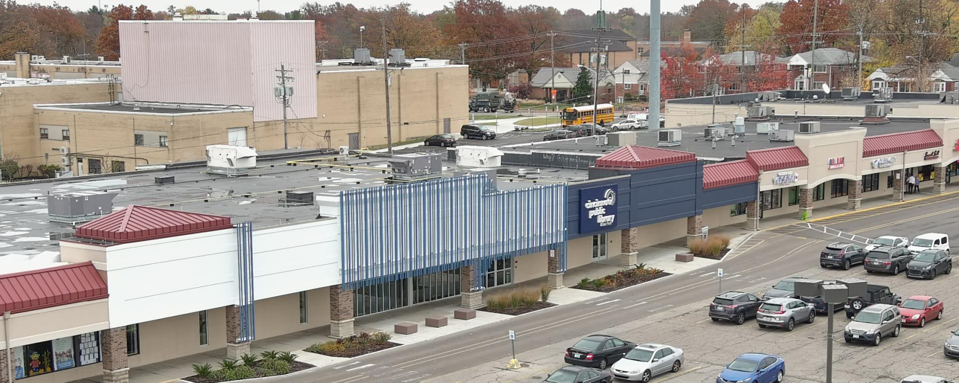 aerial photo of urban library in a strip mall and parking lot