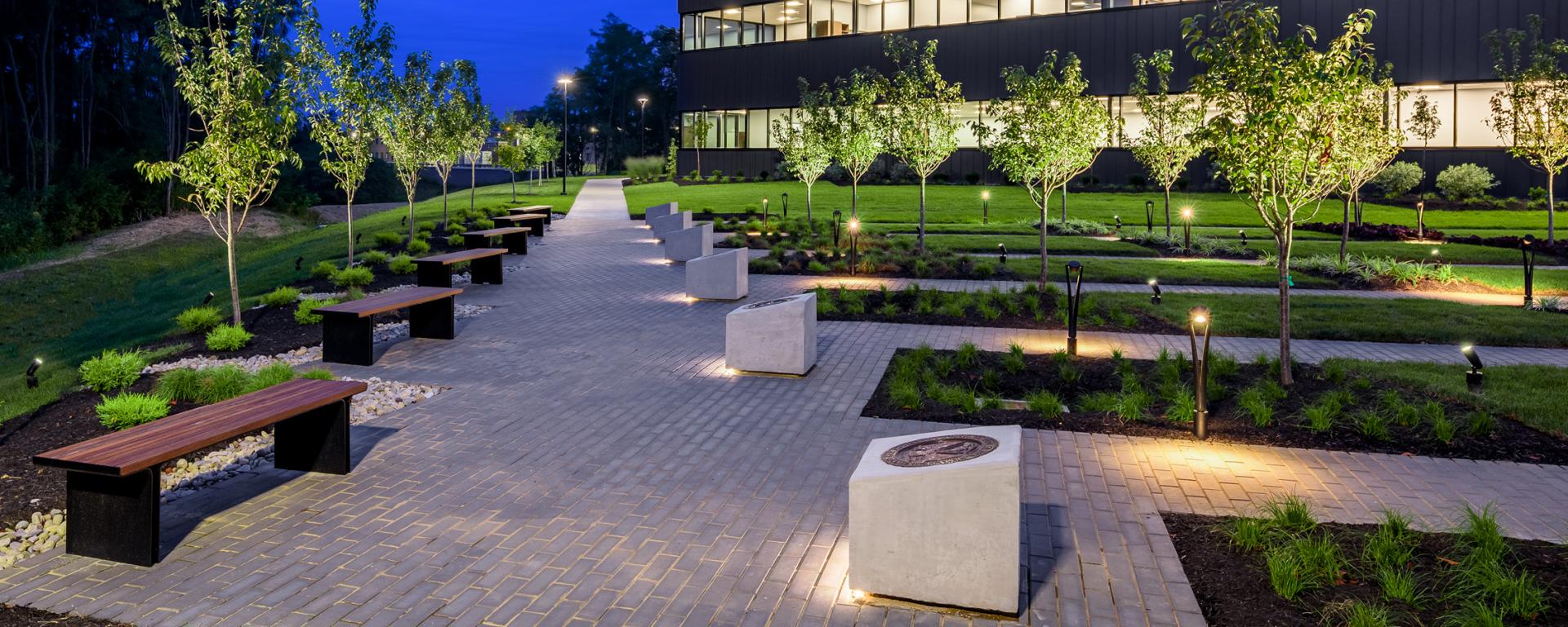 memorial garden path lit up at night