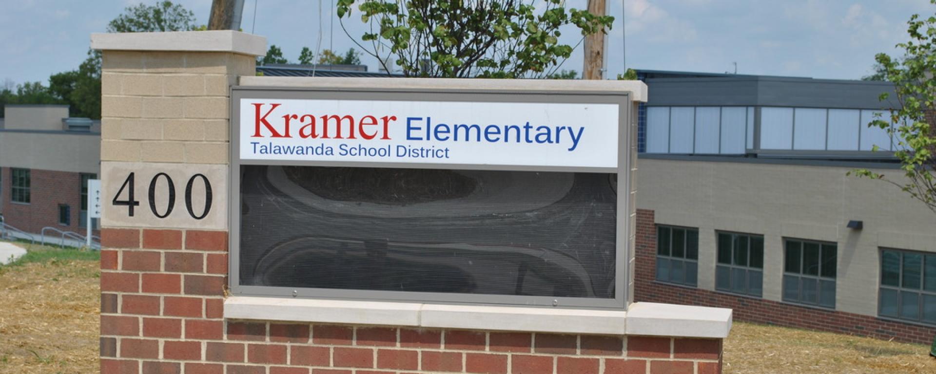 entrance sign of school