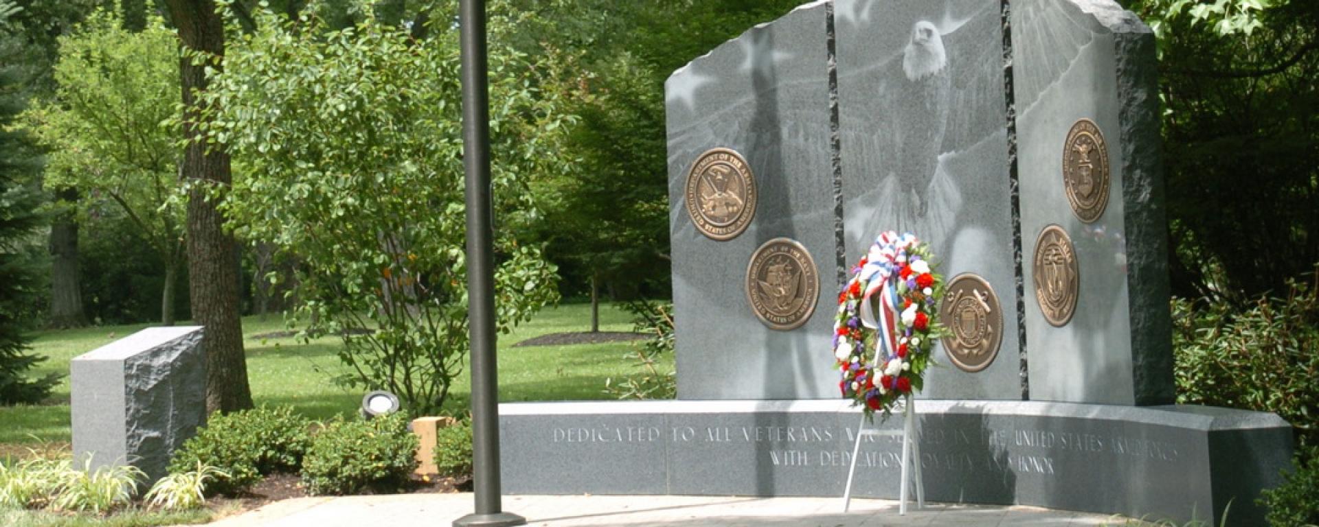 memorial with wreath in front