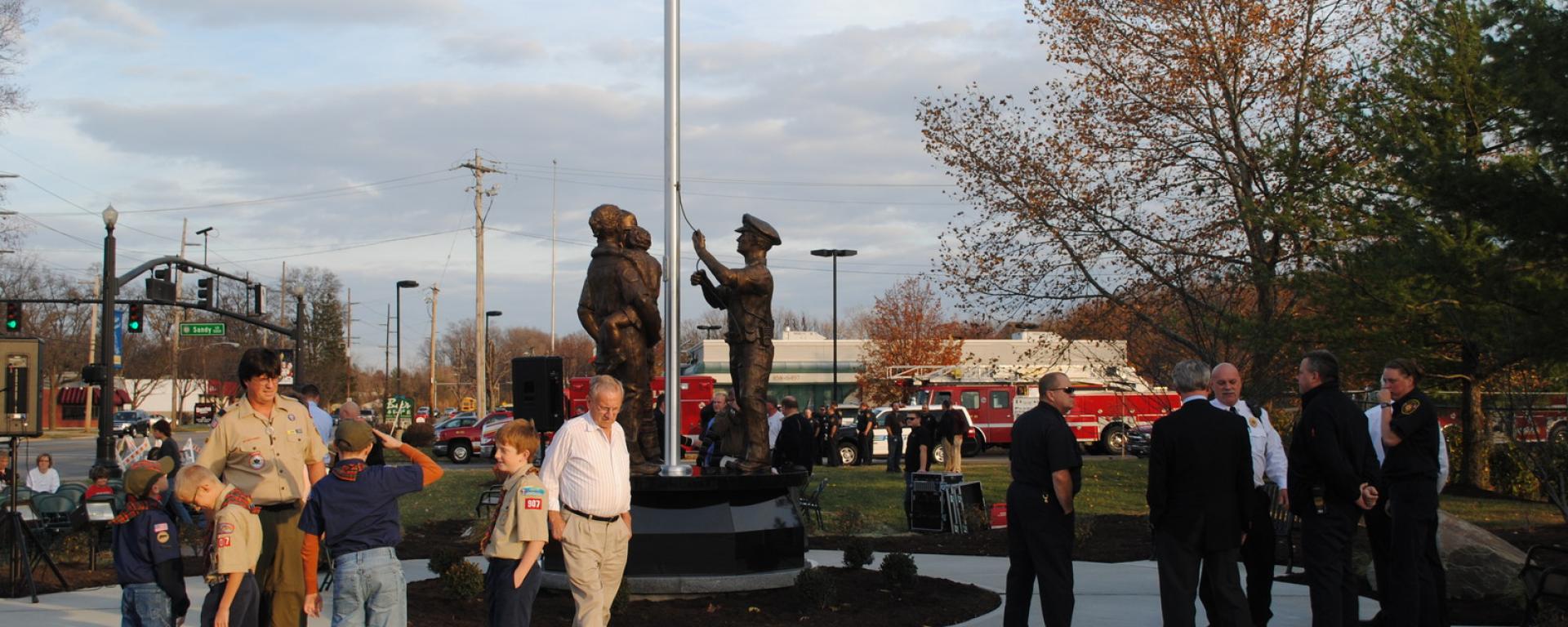 people gathered around statue