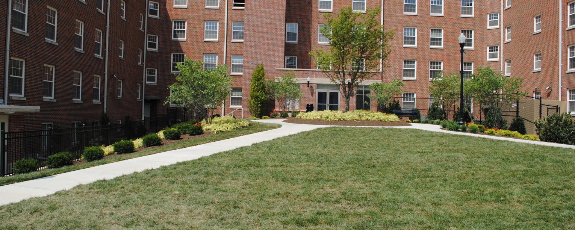 walkway outside front entrance with landscaping