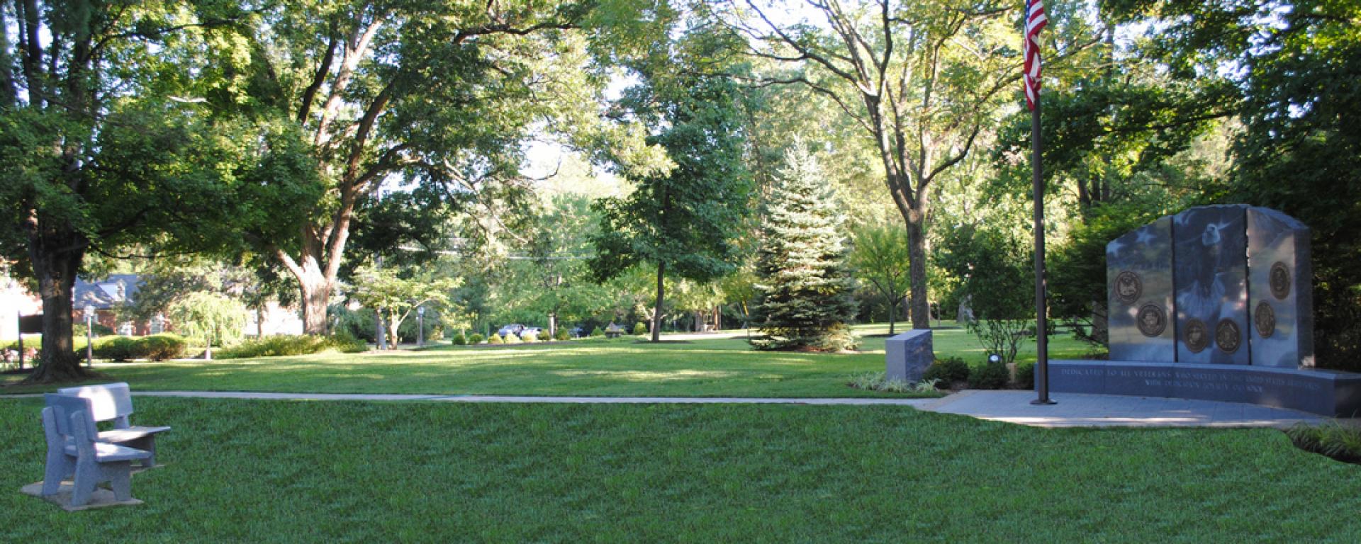 grass and reflection area surrounding memorial