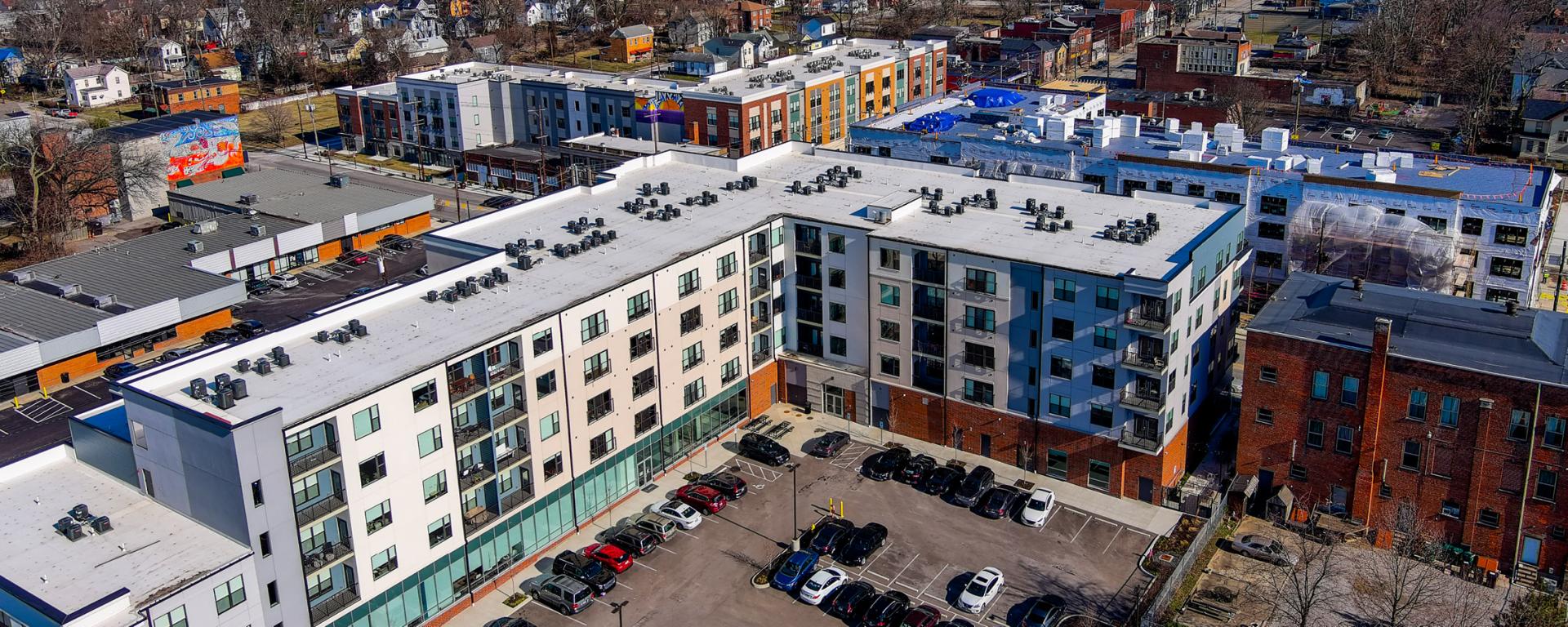 aerial photo of apartment building and parking lot