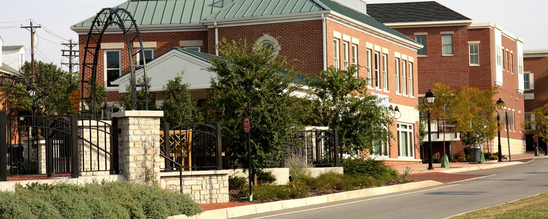 streetscape of retail buildings and courtyard