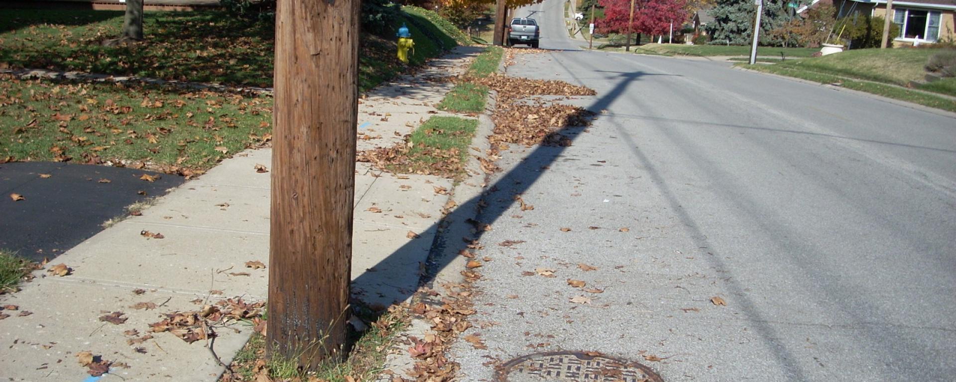 looking down street with sidewalk to the side 