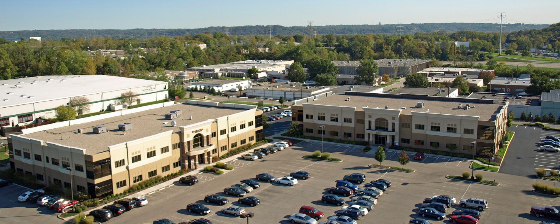 front profiles of buildings and parking lot