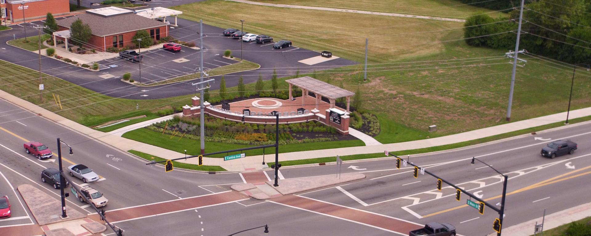 aerial photo of an intersection and welcome sign