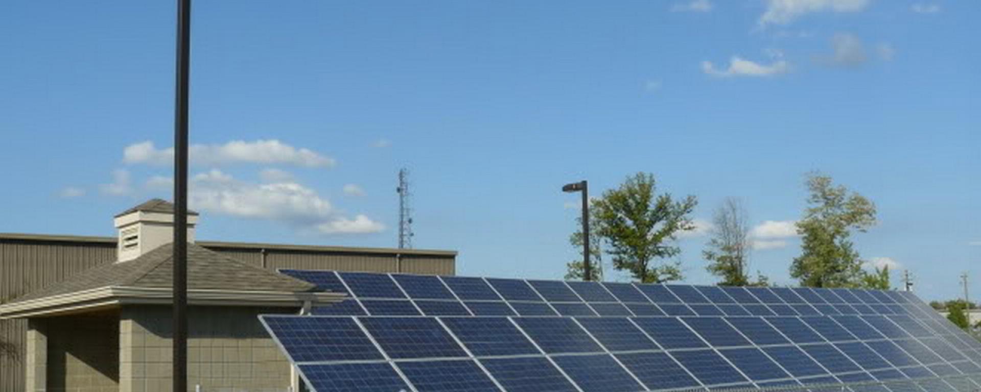 solar panels behind firehouse