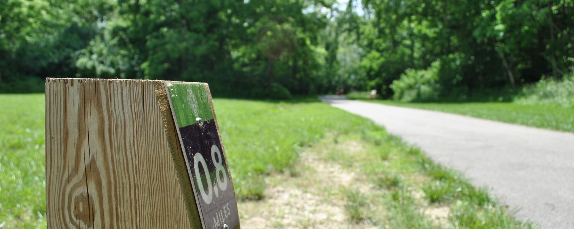 mile marker on park trail