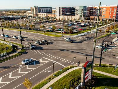 1082 Waterline Extension at Liberty Center roadway intersection with shopping center development on one side