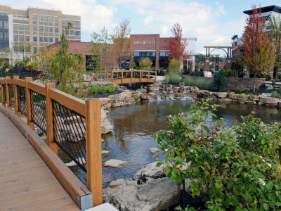 Austin Landing bridge over landscape pond