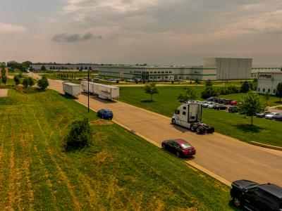 Hamilton Enterprise Park roadway with vehicles