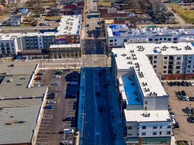 aerial photo of three mixed use buildings