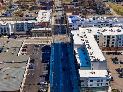 aerial photo of three mixed use buildings