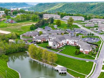 aerial photo of several building surrounding a lake