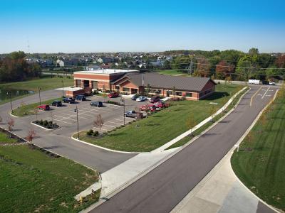 aerial of parking lot and firehouse